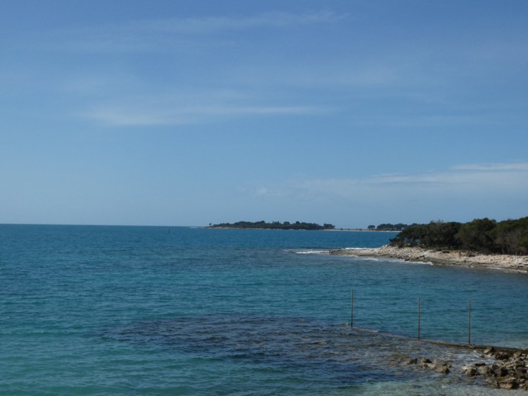 A view across turquoise seas from the safari park to other Brijuni islands on the horizon.