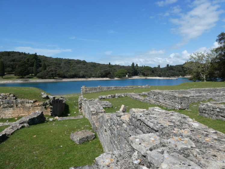 The ruins of a Roman villa running gently downhill to the bright blue of Verige Bay, the opposite side to where I was paddling.