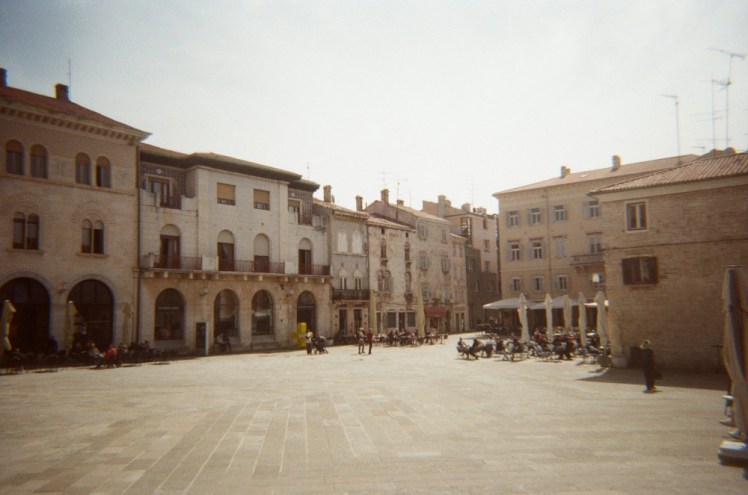 The other end of the Forum, the end with all the cafes, leading into the narrow streets. Still golden but clearly there's a bit too much sun in this direction.