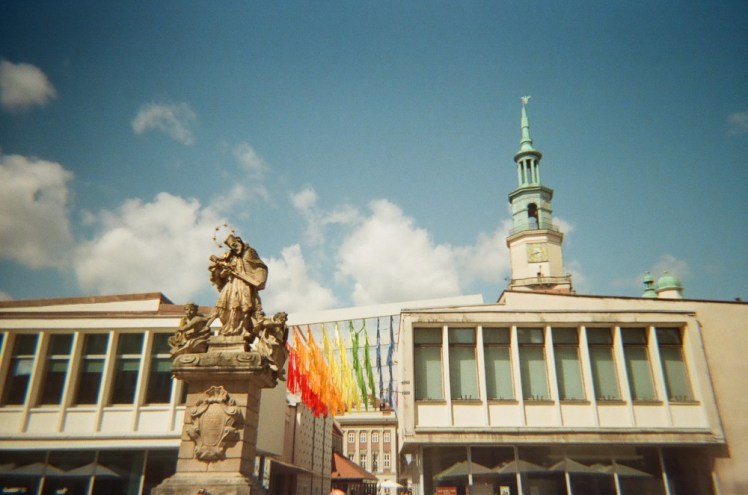 There are some more modern buildings right in the central of the square with a rainbow of ribbons filling the gaps between them.