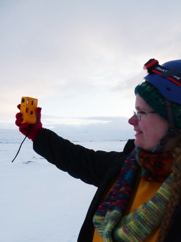 Me in full digital colour (well, a bit silhouetted against the white sky) taking a selfie with my yellow plastic film camera. You'll have to imagine for yourself what it looks like to take two selfies simultanously.