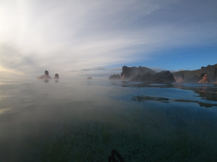 The Sky Lagoon, with just enough mist hanging over it that you can't tell where it ends. To the leftt, it's actually an infinity effect out to sea; to the right, cliffs form the back of the lagoon.