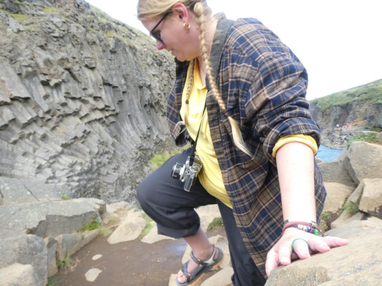 An accidental but fortuitous (and overexposed) timer selfie of me scrambling awkwardly. It was supposed to be a nice posed picture but the timer was too quick and the scramble too awkward.