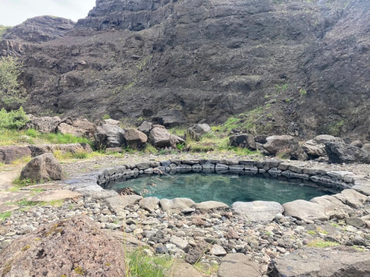 Hringur, a slightly smaller pool with the same light blue water. This one is perfectly circular and has a nice neat edge built out of stones.