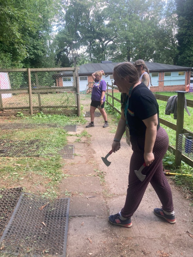 Two of us throwing small axes. I'm furthest from the camera but I look like I know what I'm doing. Axes look a lot less dramatic than they feel.