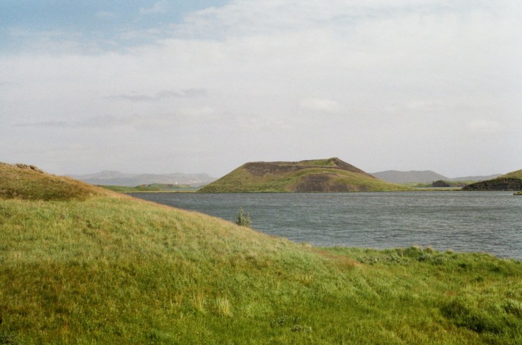 Pseudocraters at Skutustadir, lava bubbles that look like small craters around the edge of the lake.