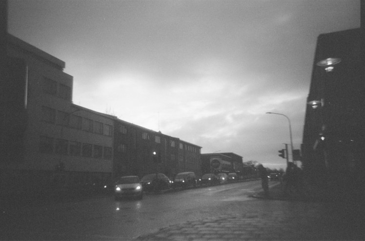 Snorrabraut, one of the main thoroughfares through Reykjavik, with traffic turning right at the lights.