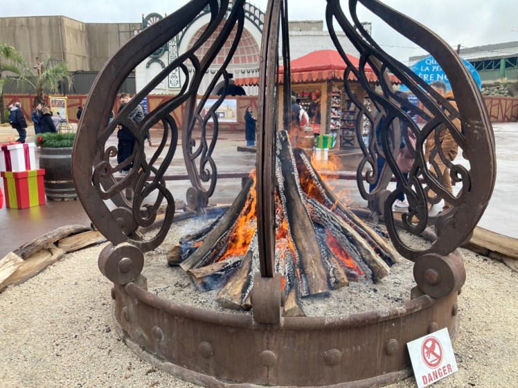 A large iron "crown" with a big fire in the middle of it. Instead of logs a foot or two long, these logs are four or five feet high and your clothes steam from six feet away because it's so hot.