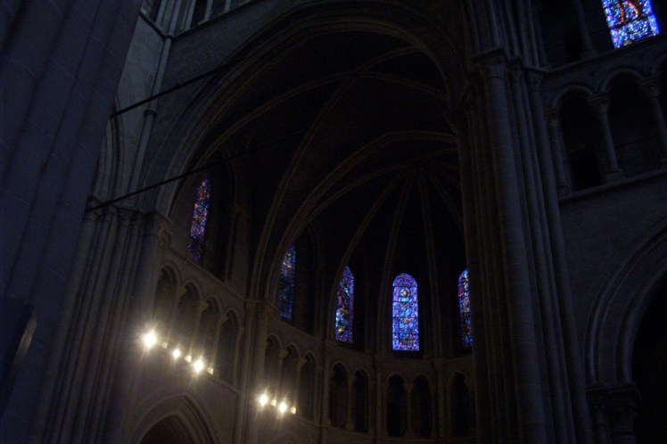 A picture of the domed east end taken in 2005/06. It looks very dark but the stained glass windows around the top of it are glowing blue in a way they only could if there was bright light outside.