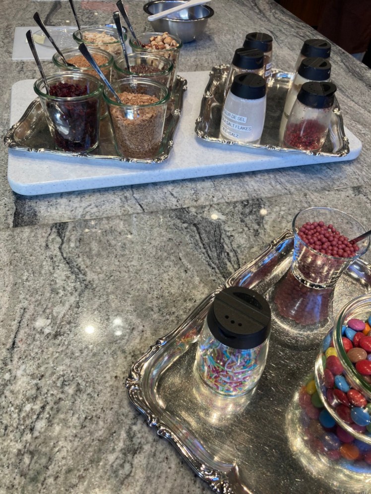 Trays of ingredients in jars for either flavouring, texturising or decorating our chocolate.