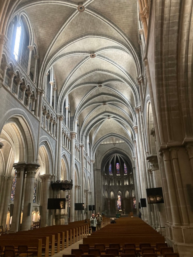 The tall Gothic nave, a little better lit than most of the rest of the pictures. The arches aren't as pointed as Gothic will get and the pillars aren't quite as slender but it's undeniably Gothic.