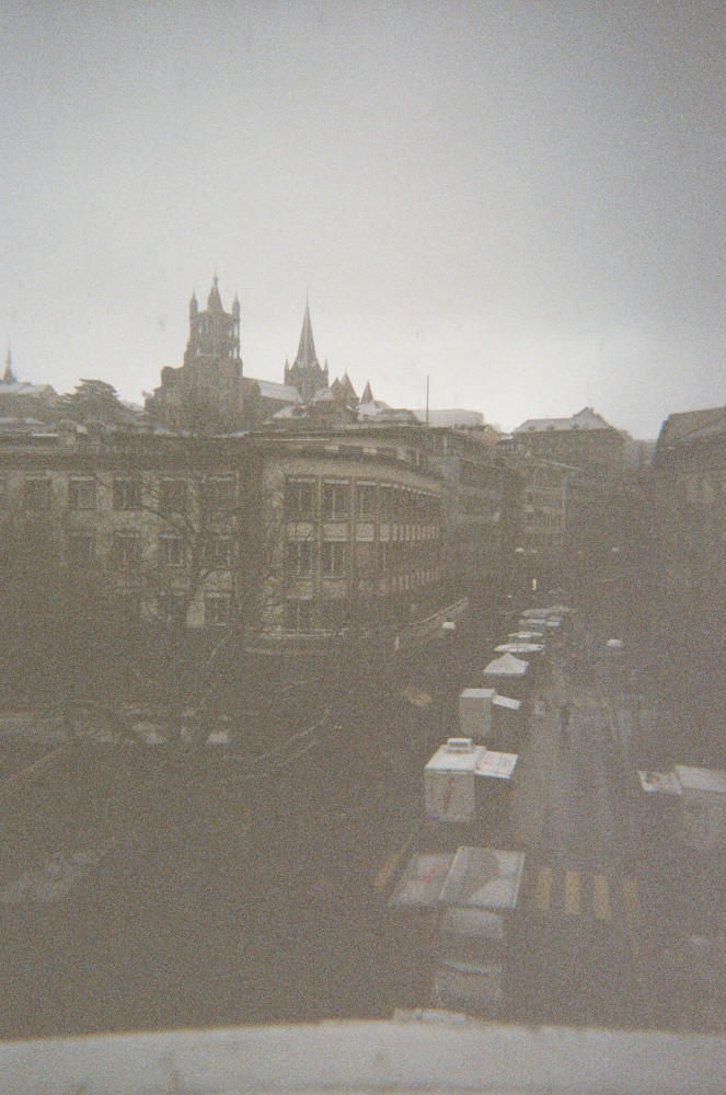 Lausanne's streets as seen from a kind of bridge over the lower city. It's in the snow still, so it's bad quality.