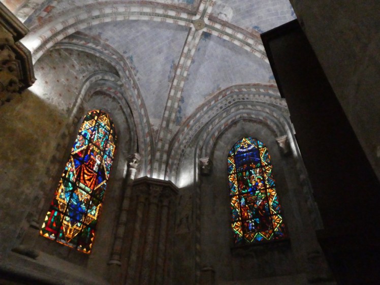 A small vaulted chamber off the south transept, its arches and pillars painted in colourful red and white stripes.