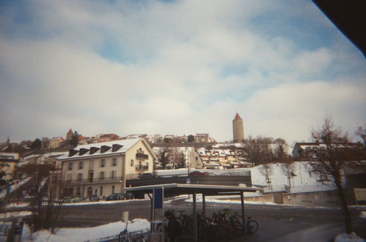 A view of an interesting-looking town from its station. There's a single tall brick tower sticking out of the town which suggests it's somewhere I'd like to explore next time.