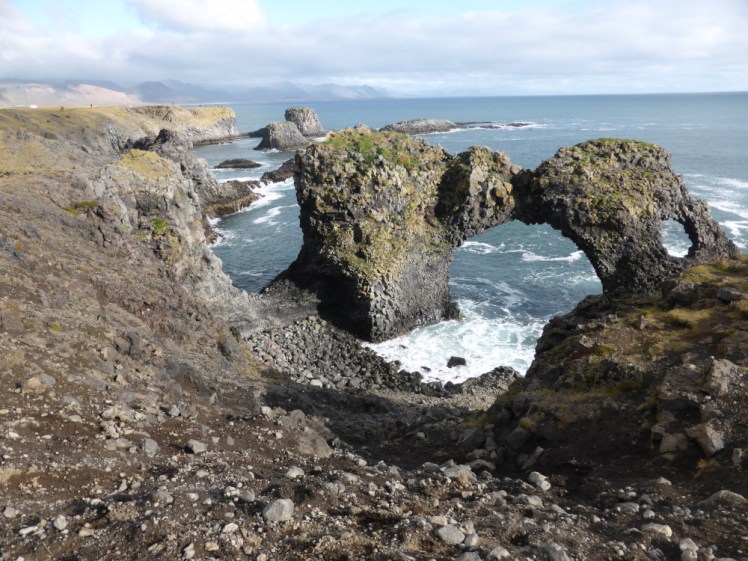 The cliffs and a sea arch at Arnarstapi, a small town on the south coast of the Snaefellsnes peninsula.