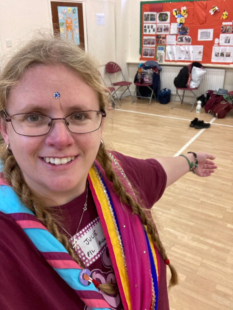 A selfie, dressed up and bejewlled over my Rebel t-shirt and neckerchief, to do some Bollywood dancing.