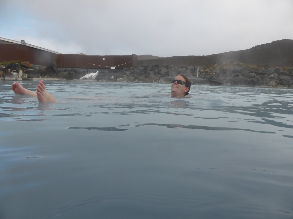 Another selfie, this time floating on my back looking up blissfully at the cloudy sky, with the active volcano slope behind me.