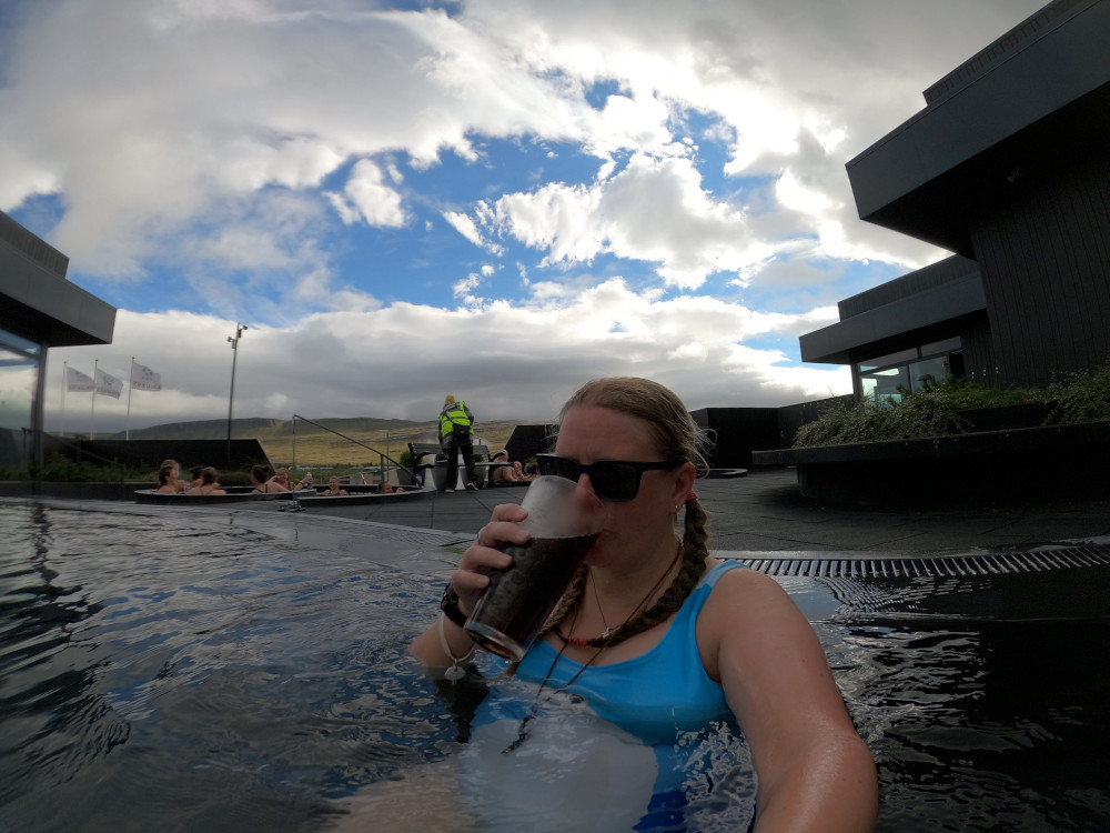 Me holding a massive glass of Coke in the central pool.