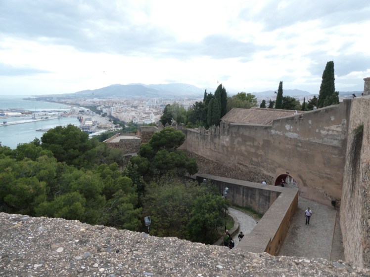 The outer walls of the Gibralfaro with an arch in the wall that lets you into the main inner castle.