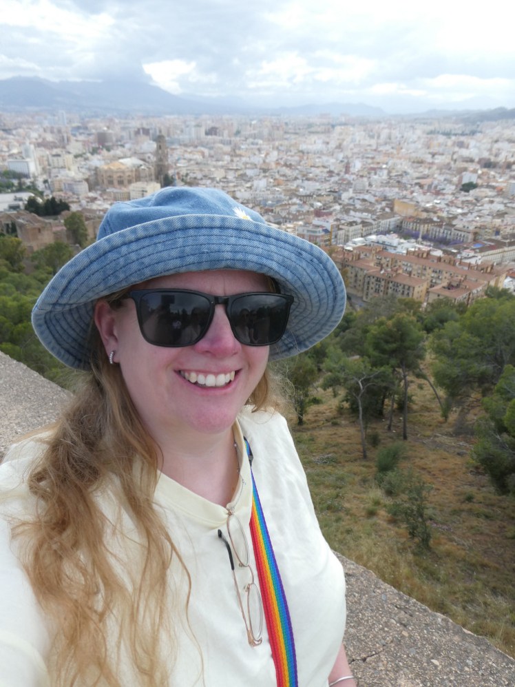 A selfie up on a high wall at the Gibralfaro with Malaga spreading out below me.