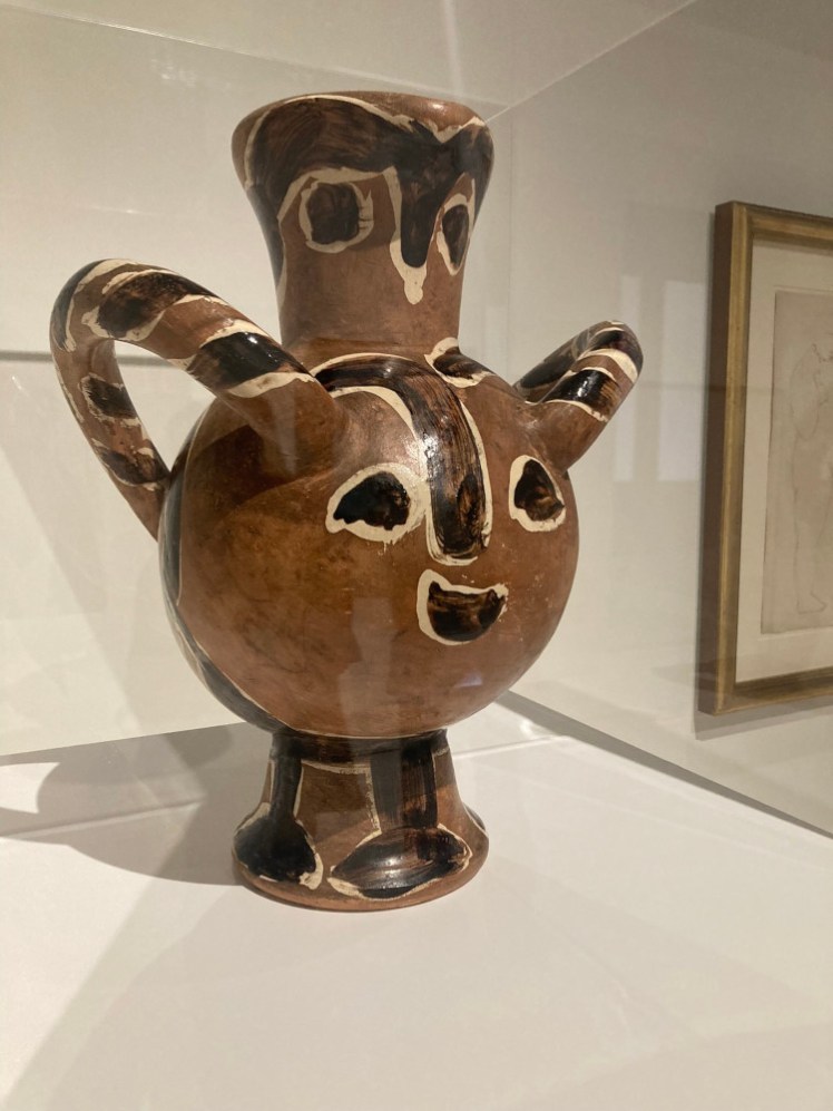 A Picasso ceramic titled Owl with Head of a Faun, which I prefer to call "a happy jug" because that's what it looks like.