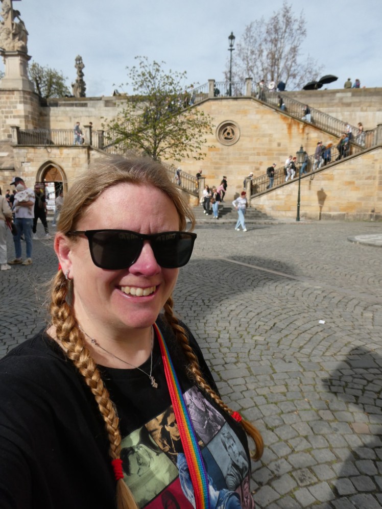 Me in my Mission: Impossible t-shirt with the steps at the eastern end of Charles Bridge.