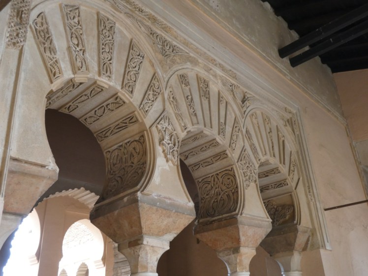 Ornate, decorative keyhole arches in one of the palaces.