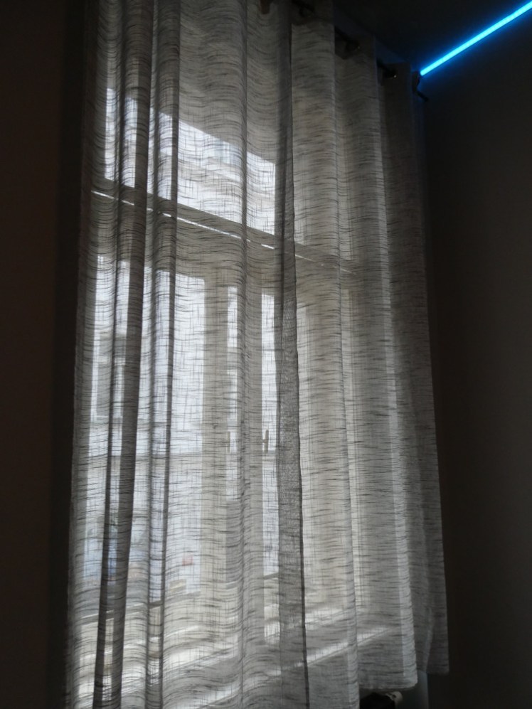Curtains so thin you can see through them while they're closed.