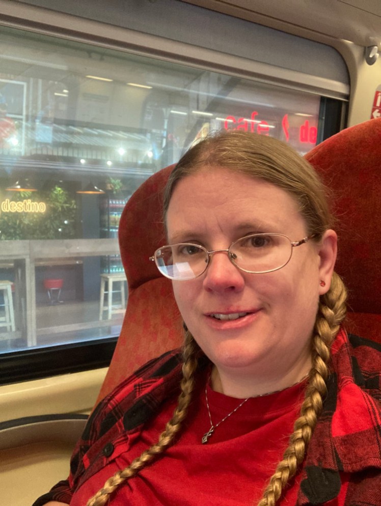 A selfie on the train. I was wearing my sunglasses in the last picture but now I've got my normal glasses on and you can tell I got up too early.