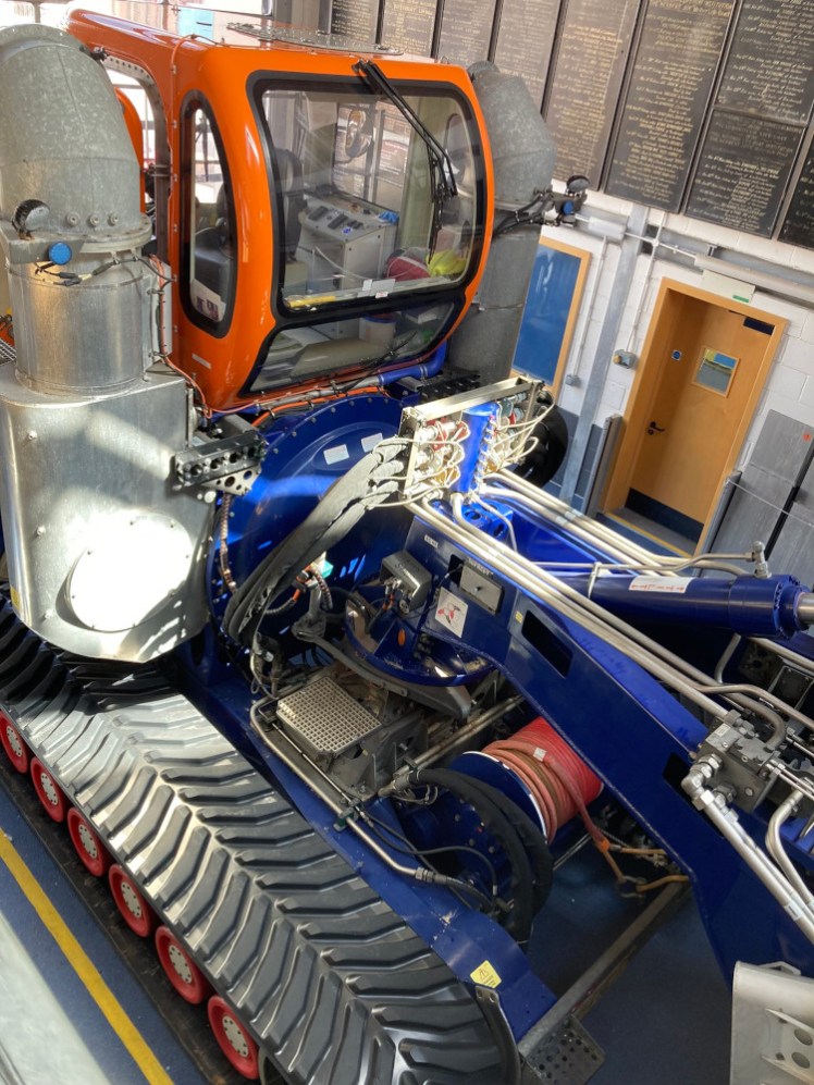 The tractor used to launch the lifeboat, in the RNLI's blue and orange. Look at the tracks, they're absolutely pristine.