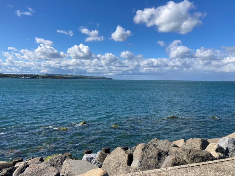 North Bay, an expanse of perfect blue water with cliffs in the distance on the far side.