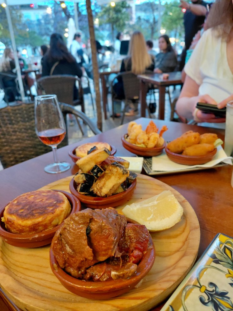 The tapas at Piccaso, all in earthenware dishes and mostly piled up well above the dish.