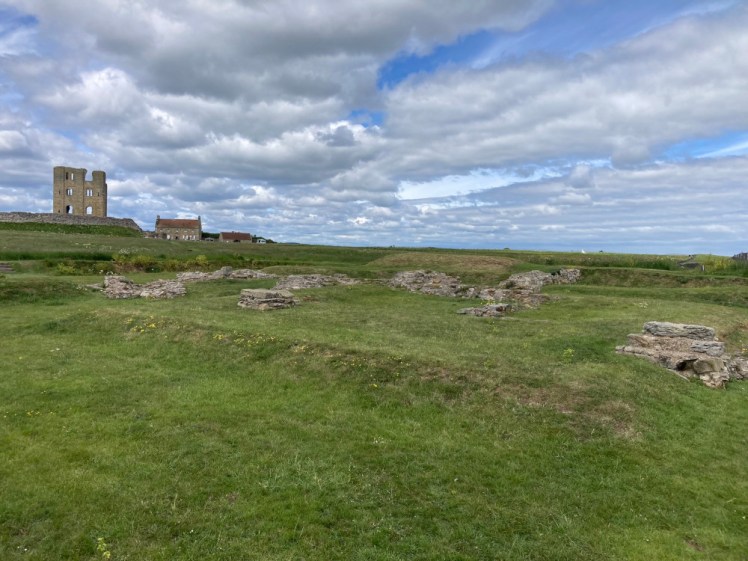 A view across the meadows from the Roman signal station at Scarborough Castle to the remains of the Great Tower.