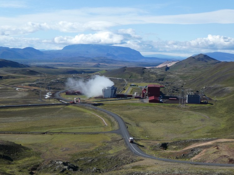 Views over the Krafla geothermal area and the power station and the mountains in the distance as seen from the viewpoint above it all.