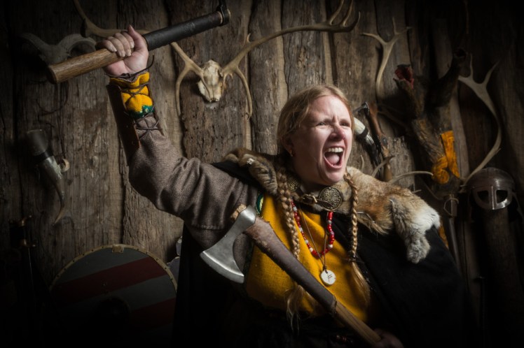 Roaring yet again, with one hatchet held crossed across my body and the other raised in the air.